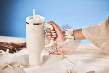 Load image into Gallery viewer, Stanley Quencher H2.0 Tumbler with Straw 40 oz | Flowstate 3-Position Lid | Cup Holder Compatible for Travel | Insulated Stainless Steel Cup | BPA-Free | Cream